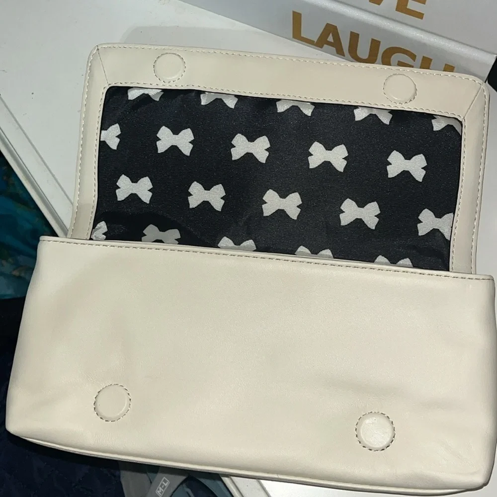 Kate Spade New York Cream Leather & Black Bow Tie Clutch